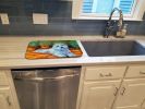 Bichon Frise  on the patio Art Dish Drying Mat