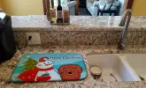 Dachshund - Longhair - Red with Merry Christmas Snowman Dish Drying Mat